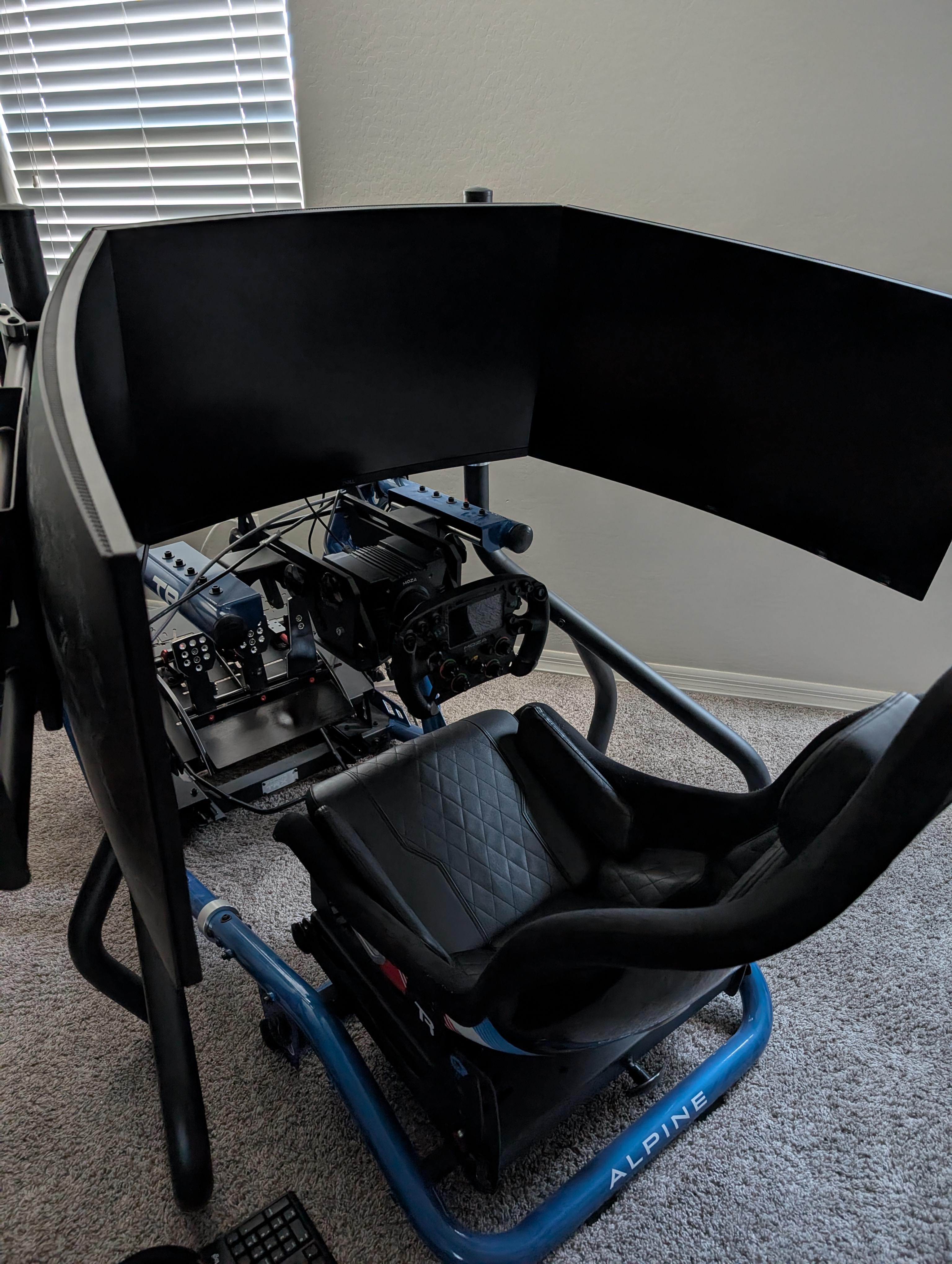 Trak Racer TRX in hybrid seating position makes this sim pretty comfy. 32" triple monitors, MOZA + Fanatec gear, and a decent PC.
